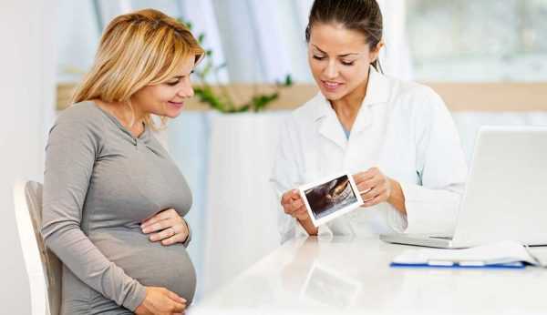 Беременная женщина на приёме у гинеколога